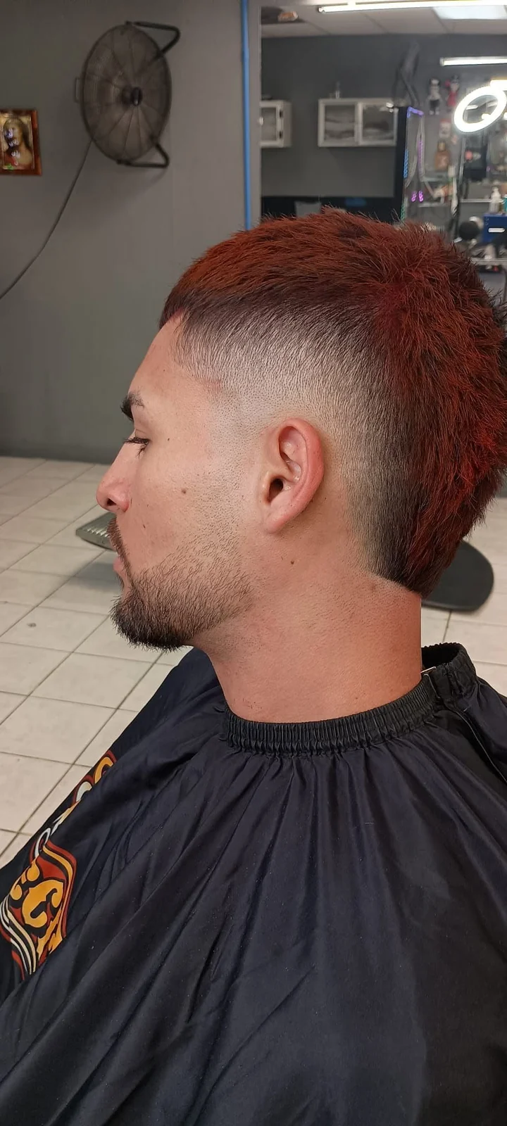 Adult client showing a finished haircut at Twins Barbershop